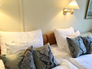 Кровать или кровати в номере Hotel Rivoli Jardin