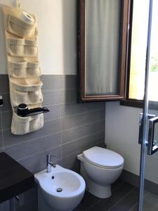 Vonios kambarys apgyvendinimo įstaigoje Villa Agape