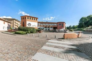 a brick road in front of a building at Lake Como Golf Hotel in Como