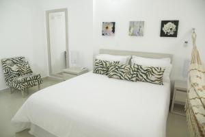 Voodi või voodid majutusasutuse HOTEL HABANA REAL toas