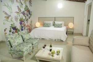 Voodi või voodid majutusasutuse HOTEL HABANA REAL toas
