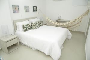 Voodi või voodid majutusasutuse HOTEL HABANA REAL toas