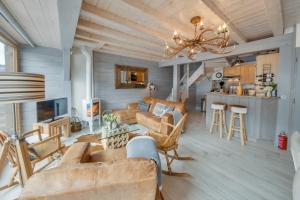 Μια τηλεόραση ή/και κέντρο ψυχαγωγίας στο Appartement Le Cerf