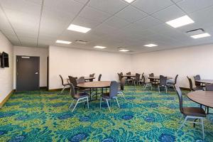 a conference room with tables and chairs on a carpet at Comfort Inn & Suites Oklahoma City near Bricktown in Oklahoma City +31 photos