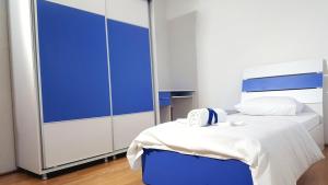 Voodi või voodid majutusasutuse Bus Station Hostel toas