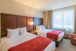 Postel nebo postele na pokoji v ubytování Comfort Suites Springfield-Eugene + 13 fotografií