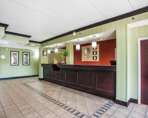 a hotel lobby with a cash counter and a waiting room at Comfort Inn Lehigh Valley West in Fogelsville