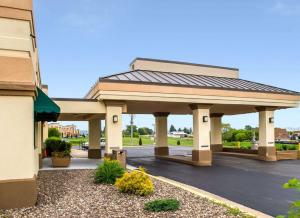 a building with a gazebo in a parking lot at Quality Inn Mill Hall - Lamar in Clintondale