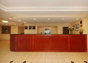 a large lobby with a bar in a building at Quality Inn & Suites in Danville