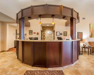 a large kitchen with a large island in a room at Comfort Suites in Altoona