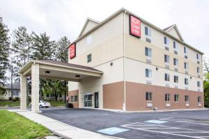 a rendering of a hotel with a parking lot at Econo Lodge Harrisburg - Hershey in Harrisburg