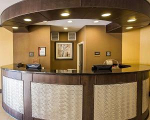 a hotel lobby with a large counter in a room at Comfort Suites Simpsonville in Simpsonville