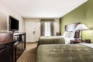 Ένα ή περισσότερα κρεβάτια σε δωμάτιο στο Quality Inn Lancaster