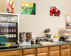 a kitchen with a counter with some food at Quality Inn Oacoma - Chamberlain in Oacoma