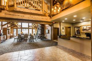 a large living room with a dining room and a kitchen at K Bar S Lodge, Ascend Hotel Collection in Keystone