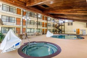 a building with a hot tub in the middle of a room at Quality Inn & Suites Sevierville - Pigeon Forge in Sevierville