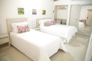 Voodi või voodid majutusasutuse HOTEL HABANA REAL toas