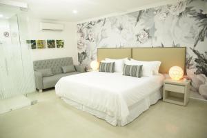 Voodi või voodid majutusasutuse HOTEL HABANA REAL toas