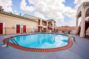 a large swimming pool in the middle of a building at Quality Inn & Suites in Covington