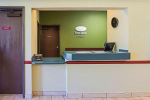 a lobby with a desk with a laptop on it at Econo Lodge Inn & Suites in Ripley