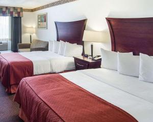 Postel nebo postele na pokoji v ubytování Quality Inn