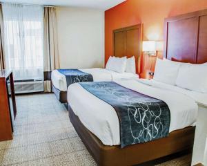 Кровать или кровати в номере Comfort Suites Tyler South