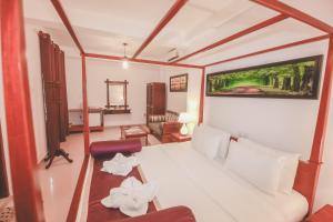 Postel nebo postele na pokoji v ubytování Villa Paradise
