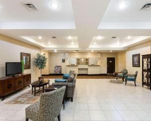 a large living room with a couch and chairs at Comfort Inn & Suites Regional Medical Center in Abilene
