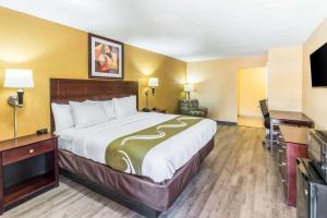 Postel nebo postele na pokoji v ubytování Quality Inn