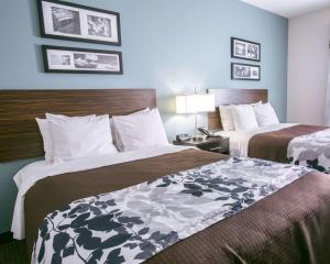 Postel nebo postele na pokoji v ubytování Sleep Inn & Suites Austin North - I-35