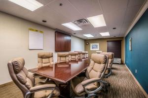 a conference room with a long table and chairs at Quality Inn and Suites Seabrook - NASA - Kemah in Seabrook