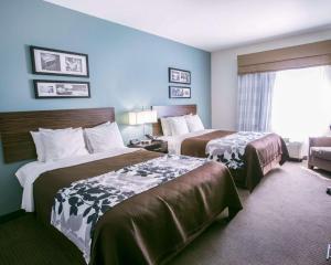Postel nebo postele na pokoji v ubytování Sleep Inn & Suites Austin North - I-35