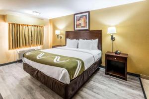 Postel nebo postele na pokoji v ubytování Quality Inn
