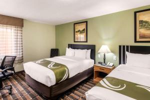 Postel nebo postele na pokoji v ubytování Quality Inn & Suites Plano East - Richardson