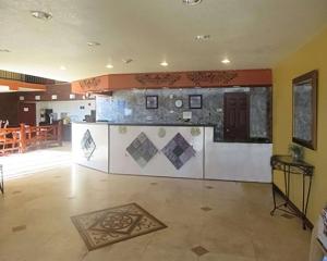 The lobby or reception area at Rose City Inn & Suites