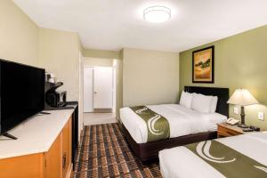 Postel nebo postele na pokoji v ubytování Quality Inn & Suites Plano East - Richardson