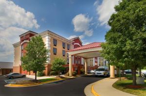 a rendering of a hotel with a parking lot at Comfort Suites Dulles Airport in Chantilly