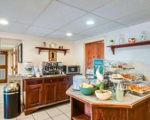 a kitchen with a counter with some food on it at Quality Inn Christiansburg - Blacksburg in Christiansburg