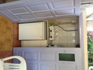 A kitchen or kitchenette at Konstantina Studios