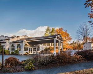 a house with a pavilion in front of it at Align Inn Vermont in Quechee
