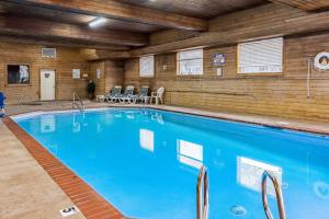 a large swimming pool in a building at Quality Inn & Suites Vancouver North in Vancouver