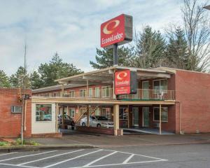 a building with a burger king sign on top of it at Econo Lodge in Vancouver