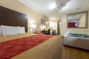 Postel nebo postele na pokoji v ubytování Econo Lodge