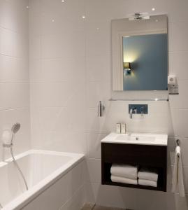 Ванная комната в Fletcher Hotel-Restaurant Duinzicht