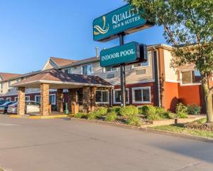 a street sign in front of a hotel at Quality Inn & Suites in Eau Claire