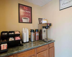 a coffee machine sitting on a counter in a coffee shop at Econo Lodge Near Bluefield College in Bluefield