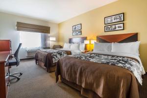 Sleep Inn & Suites Douglas客房内的一张或多张床位