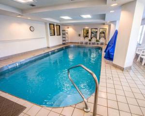 a swimming pool with a tub and a shower in it at Sleep Inn & Suites Princeton I-77 in Princeton