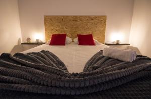 Кровать или кровати в номере Mitós Vila 3