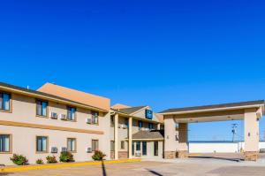 a rendering of a hotel with a parking lot at Quality Inn Great Bend in Great Bend